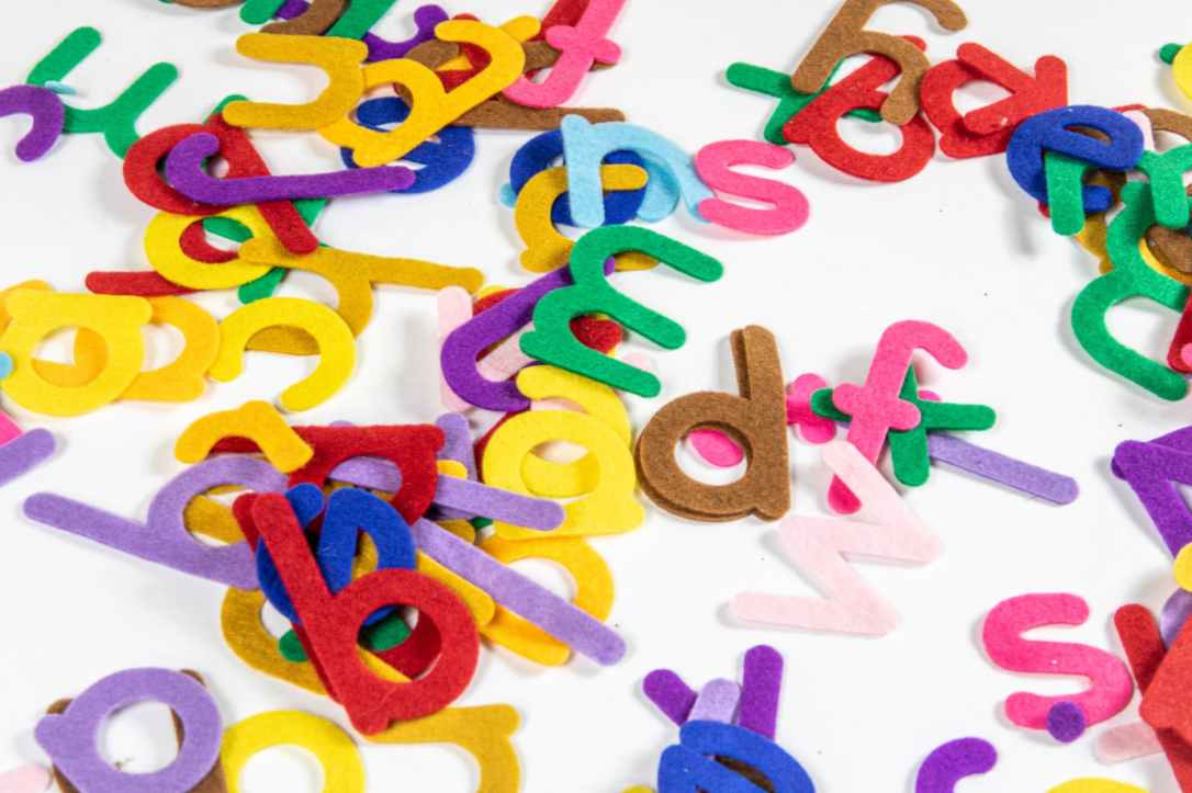 assorted colorful cutouts of alphabet